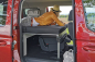 Preview: VanEssa Schlafsystem im VW Caddy 5 Maxi Ford Grand Tourneo Connect 3 Seitenansicht aufgebaut